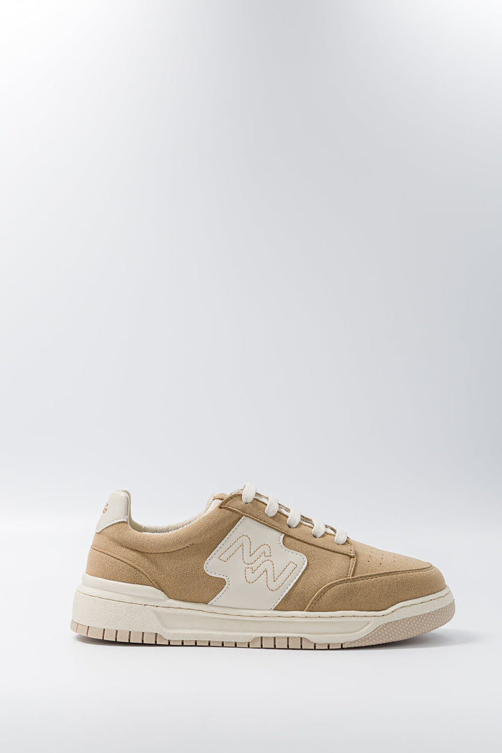 Vue de profil des baskets unisexes Dream Big Dune