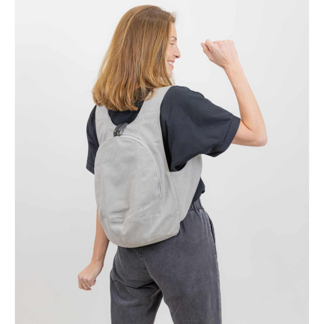 Sac à dos Estival Arsayo gris clair toile confortable ergonomique antivol sécurise vegane porte