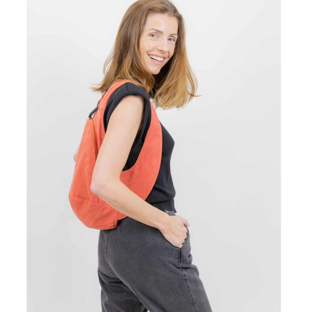 Sac à dos Estival Arsayo orange saumon corail toile confortable ergonomique antivol sécurise vegane porte cote