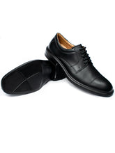 Load image into Gallery viewer, Pair of black vegan waterproof Derby shoes showing grip outsole and smart square toe design