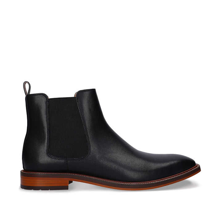 DUNCAN Black vegan Chelsea boot side view — men’s vegan boot in all-black with stacked wood and rubber sole, NAE Vegan Shoes