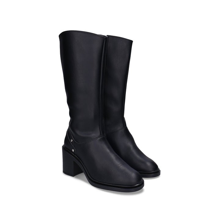 BETIA Black vegan knee-high heeled boot side view — sleek black silhouette with block heel and silver stud detail, made in Portugal