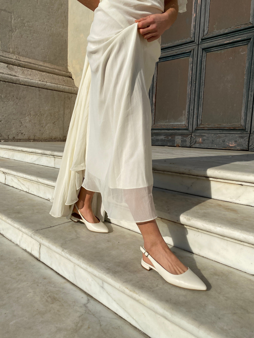chaussures blanche style ballerines ouverte à bout pointu blanche