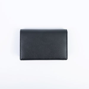 Petit porte-monnaie Uppeal™ noir, un accessoire végane raffiné imaginé à Paris pour le quotidien.