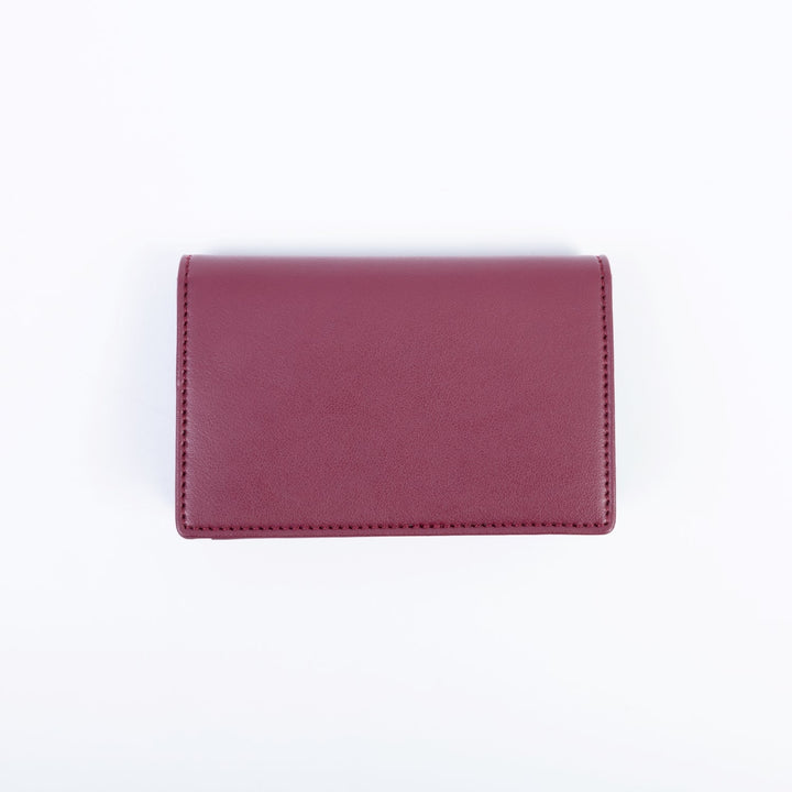 Accessoire de petite maroquinerie végane : porte-monnaie femme élégant, doublure recyclée, fabrication respectueuse de l’environnement.