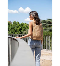 Load image into Gallery viewer, snake skin cork Arsayo backpack with a woman model