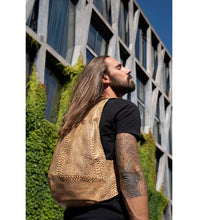 Load image into Gallery viewer, snake skin cork Arsayo backpack with a man model