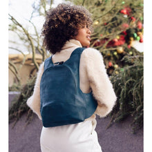 Load image into Gallery viewer, peacock blue Arsayo backpack with a woman model