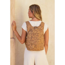 Load image into Gallery viewer, photo of the light natural cork Arsayo backpack with a woman model